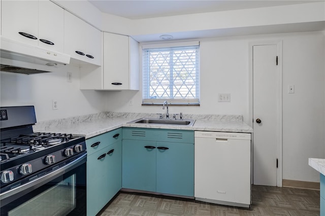 kitchen featuring white dishwasher, blue cabinets, white cabinets, sink, and stainless steel gas stove