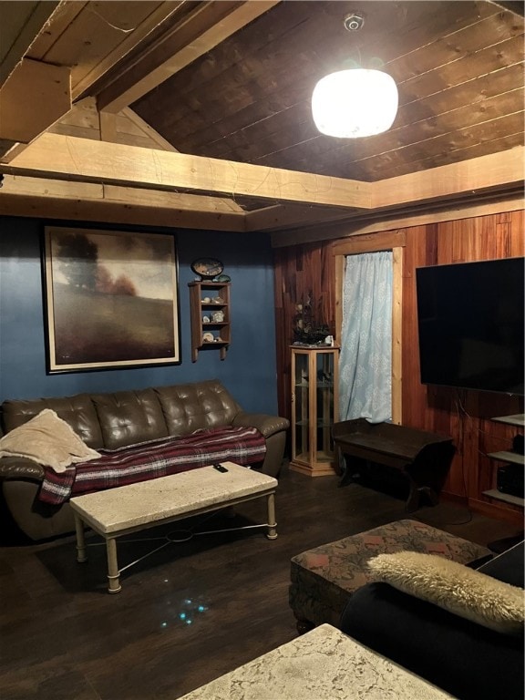 living room with wooden walls, dark hardwood / wood-style flooring, lofted ceiling with beams, and wooden ceiling