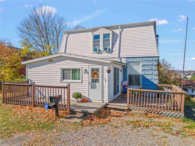 view of front of house with a wooden deck