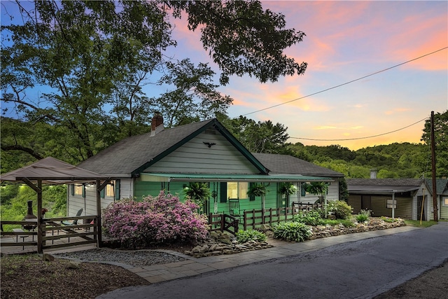 view of front of property featuring covered porch