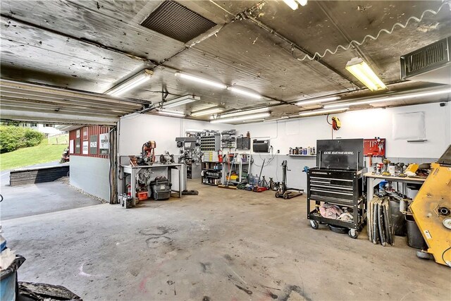 garage with a workshop area