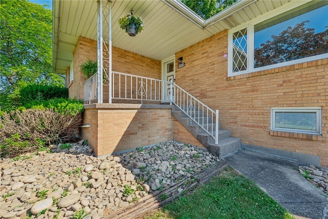 property entrance with covered porch