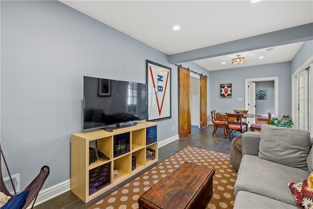 tiled living room with a barn door