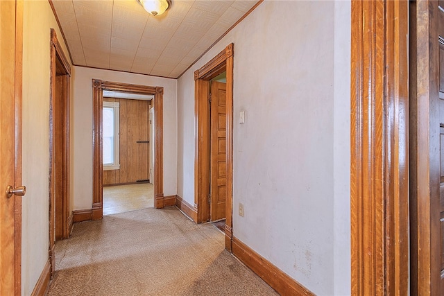 corridor with light colored carpet