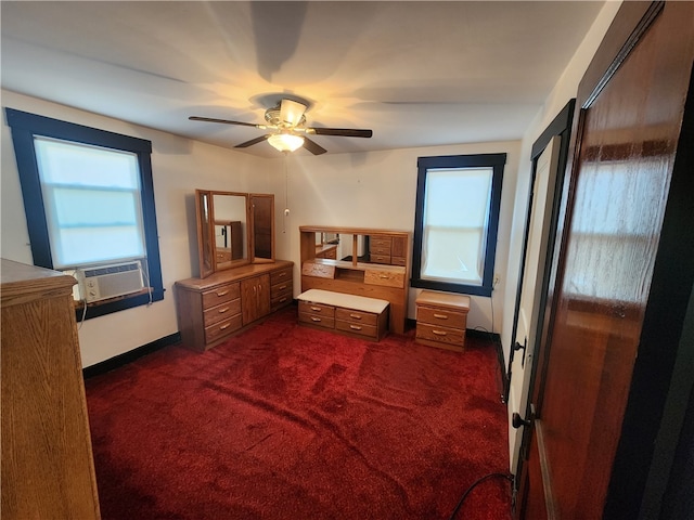 bedroom with ceiling fan and dark colored carpet