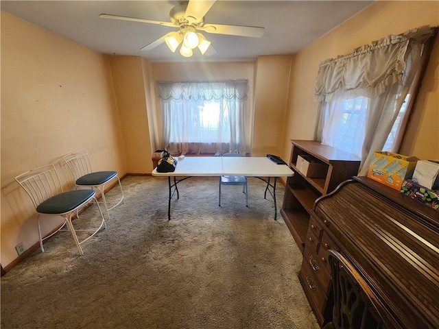 office area featuring carpet flooring and ceiling fan