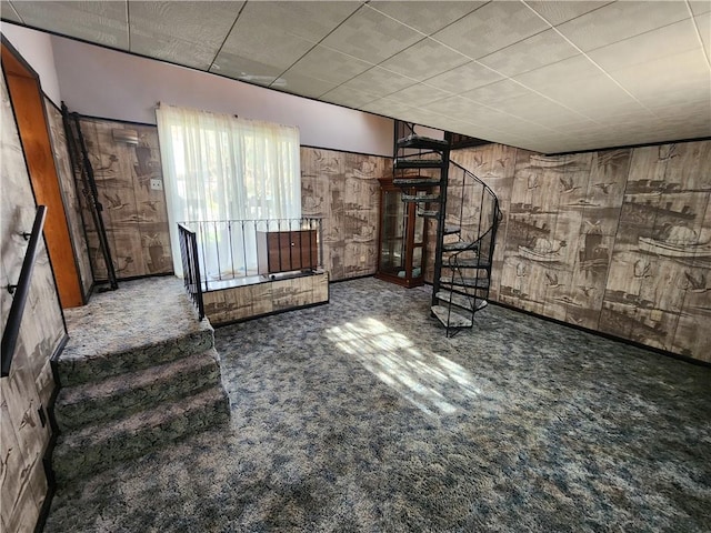 8298 Ohio River Blvd, Emsworth, PA 15202 - unfurnished living room featuring stairs, carpet, and wood walls
