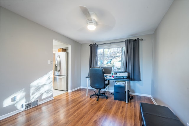 office area with hardwood / wood-style floors and ceiling fan