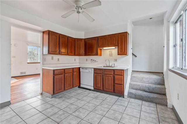 kitchen with ceiling fan, light hardwood / wood-style floors, sink, and white dishwasher