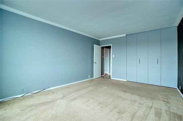 unfurnished bedroom with light carpet and ornamental molding