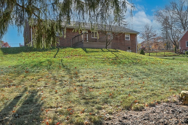 view of yard featuring a deck