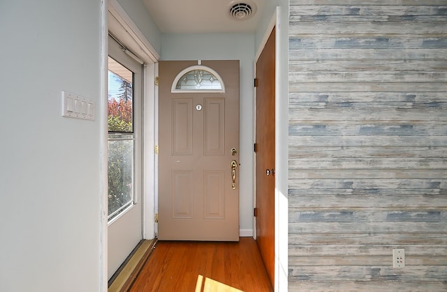 doorway with light hardwood / wood-style flooring