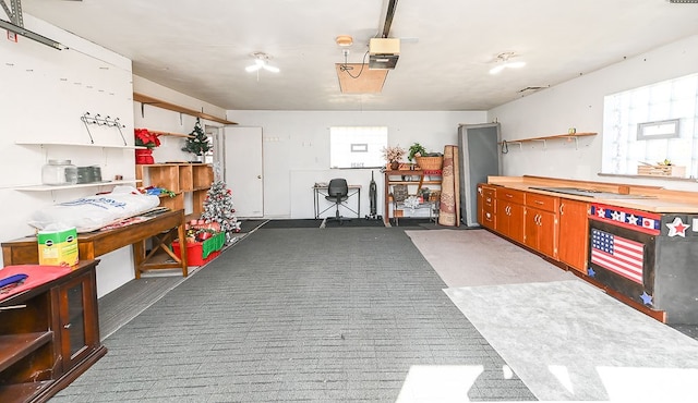 garage featuring a garage door opener