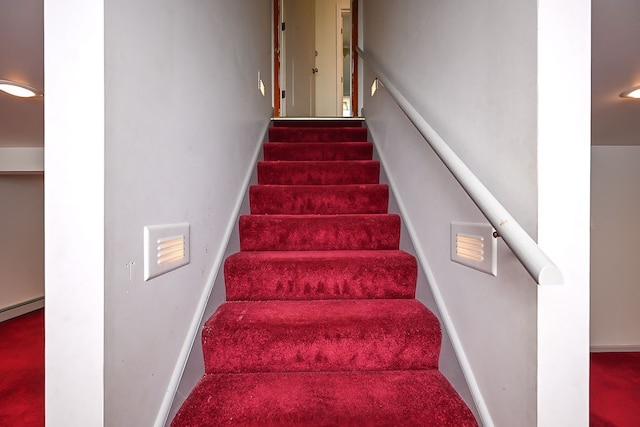 stairway with carpet floors