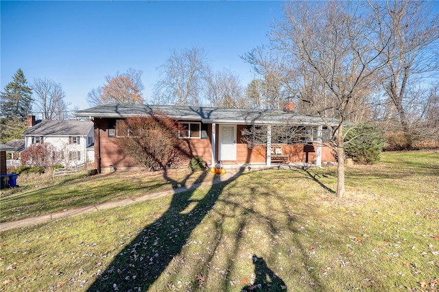 view of front of house with a front lawn