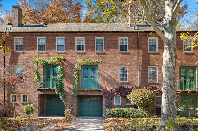 view of front of property with a garage