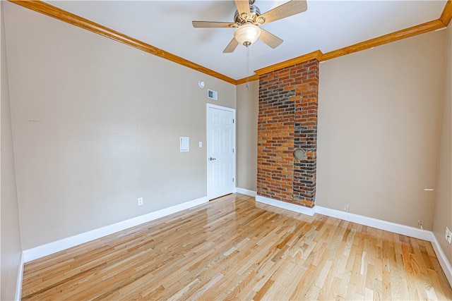 empty room featuring light wood-type flooring, ceiling fan, and crown molding