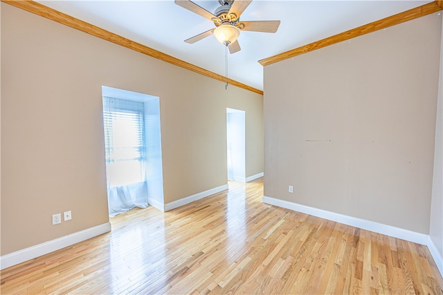 unfurnished room with light wood-type flooring, ceiling fan, and ornamental molding