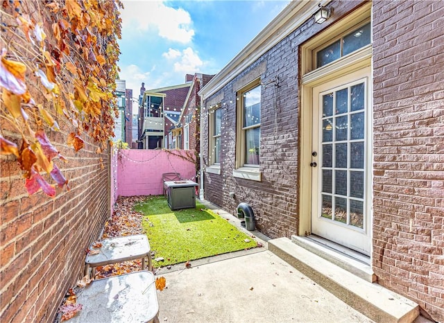 1718 Sarah St, South Side, PA 15203 - view of side of home featuring brick siding and a patio area