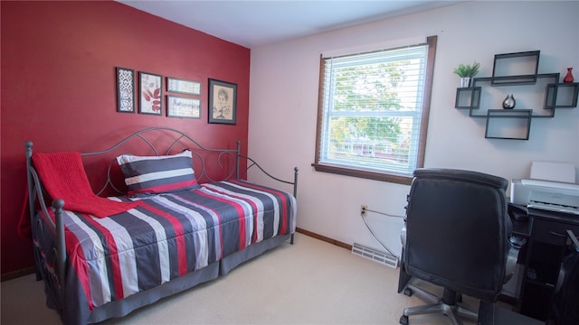 bedroom featuring carpet