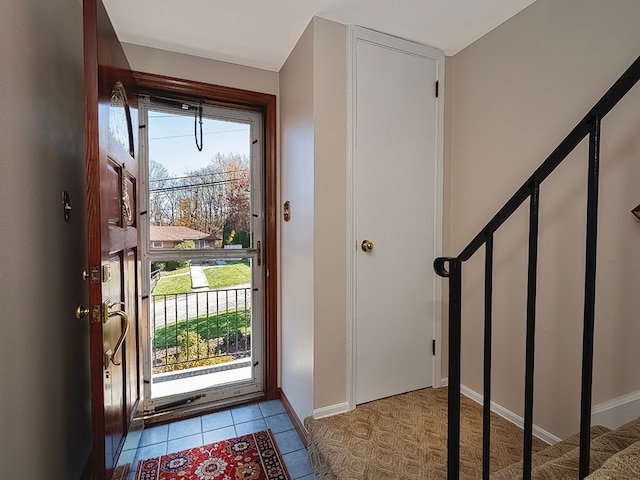 foyer with light tile patterned floors