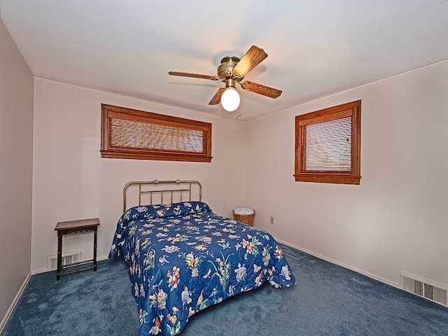 carpeted bedroom with ceiling fan