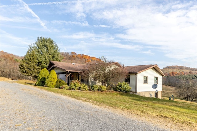 view of front of property with a front lawn