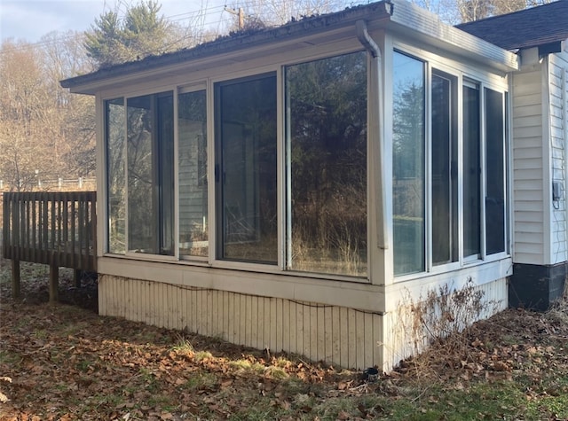 view of home's exterior featuring a sunroom