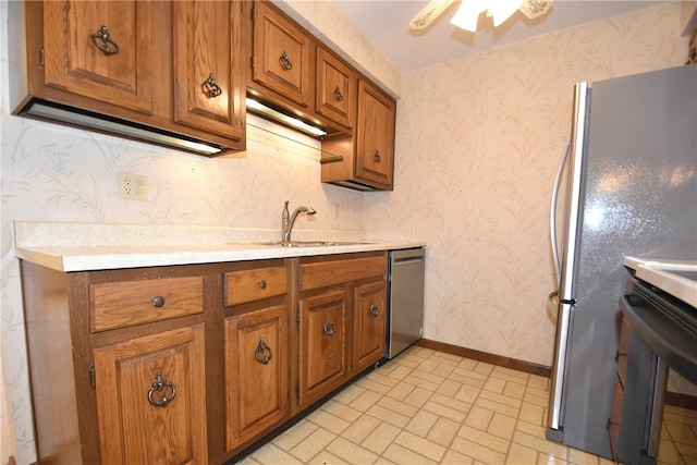 kitchen with appliances with stainless steel finishes and sink