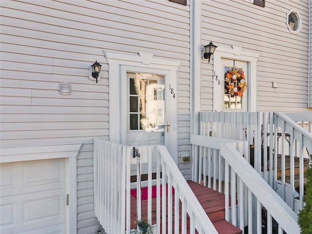 property entrance with a garage