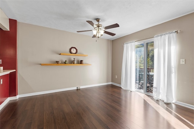 interior space featuring dark hardwood / wood-style flooring, a textured ceiling, and ceiling fan