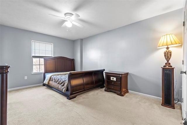 bedroom with light colored carpet and ceiling fan