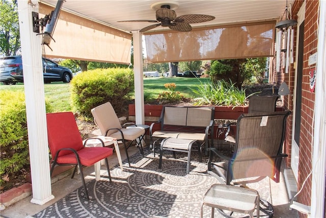 view of patio with outdoor lounge area and ceiling fan