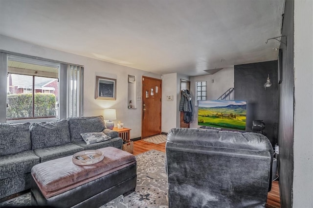 living room with light hardwood / wood-style flooring