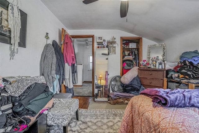 bedroom featuring a closet, vaulted ceiling, hardwood / wood-style flooring, and ceiling fan