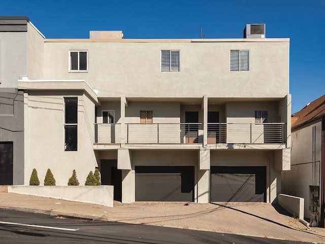 view of building exterior featuring a garage