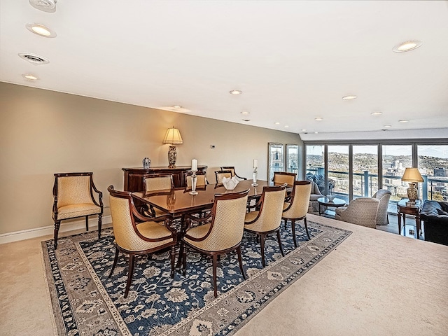 dining area with carpet