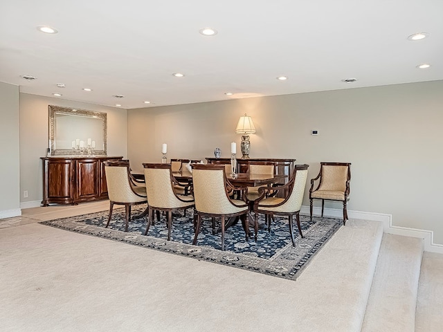 view of carpeted dining space