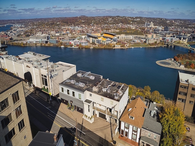 drone / aerial view with a water view