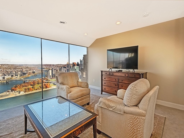 interior space featuring carpet floors and a water view