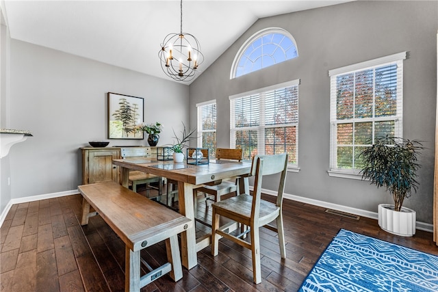 dining area with vaulted ceiling, a notable chandelier, and dark hardwood / wood-style floors