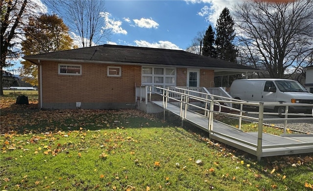 view of property exterior featuring a lawn