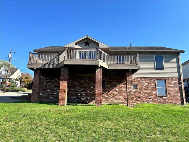 rear view of property with a lawn