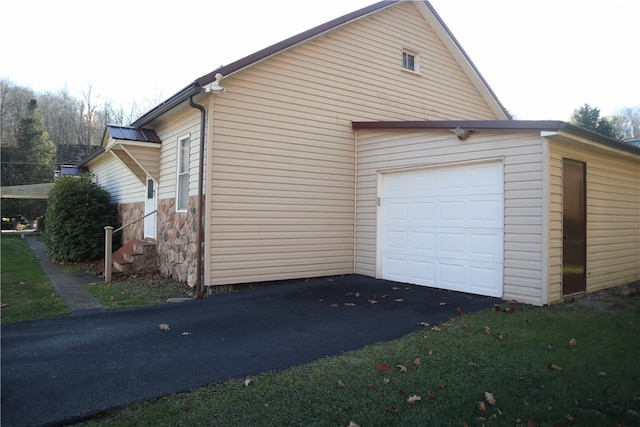 view of home's exterior featuring a garage