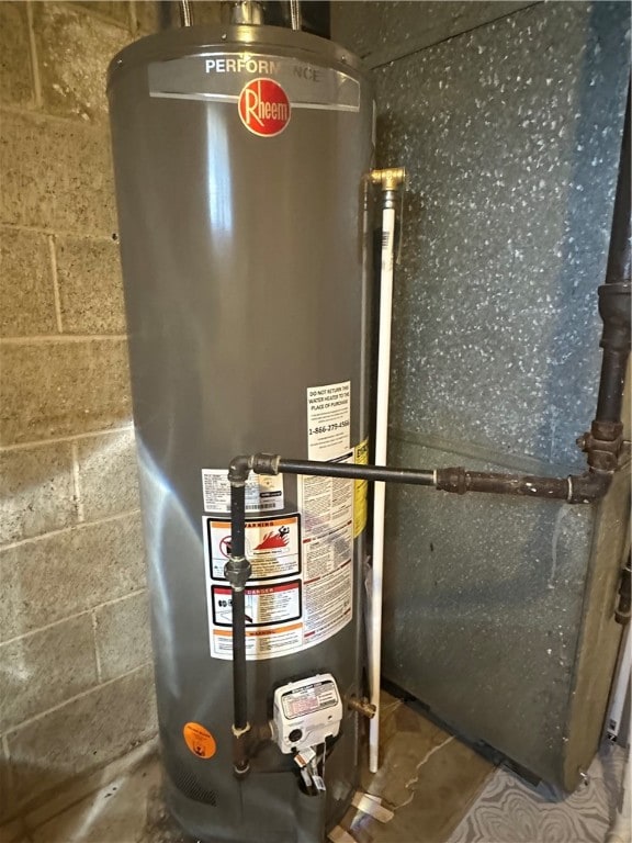 utility room with water heater