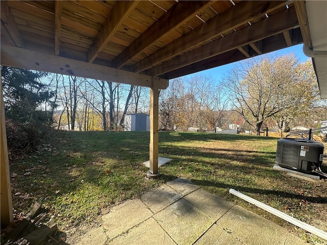 view of yard featuring a patio and cooling unit