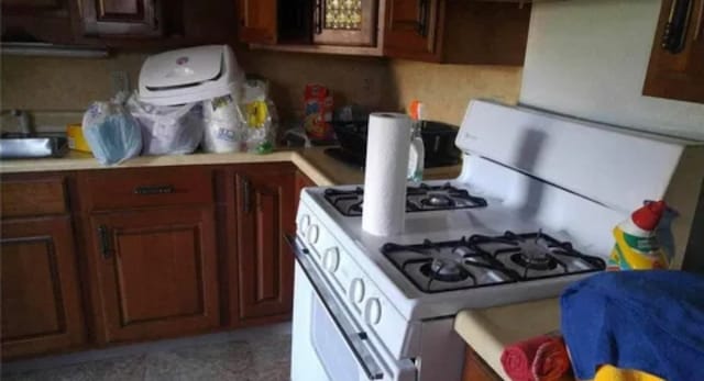 kitchen featuring white gas range oven