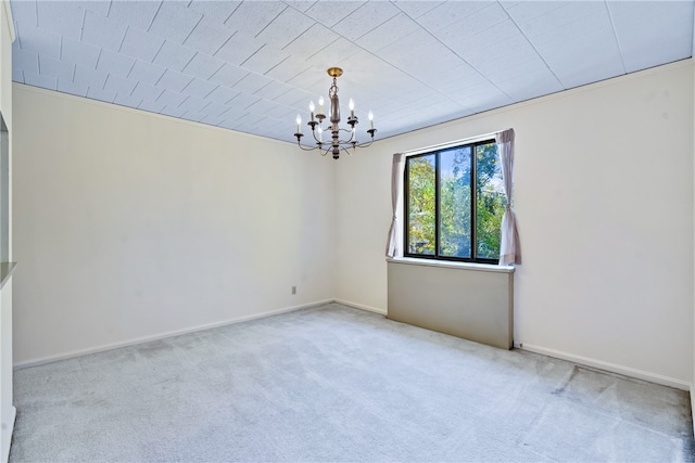 unfurnished room with light colored carpet and an inviting chandelier