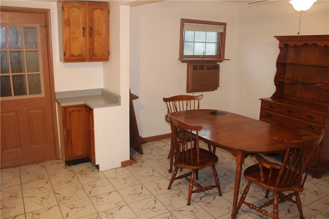 dining area with a wall mounted AC