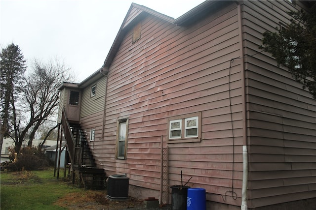 view of property exterior with central air condition unit